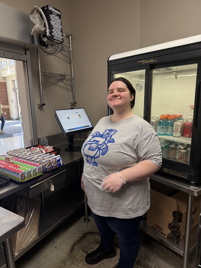 Food service worker smiling at camera