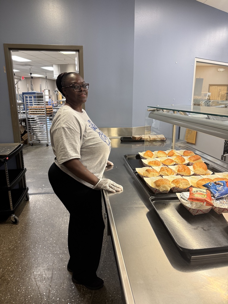 Food service worker smiling at camera