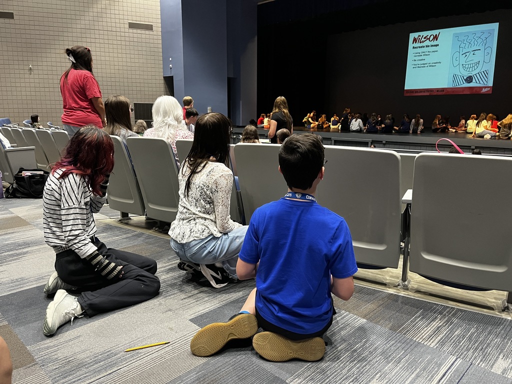 Yearbook students participating in workshop activities