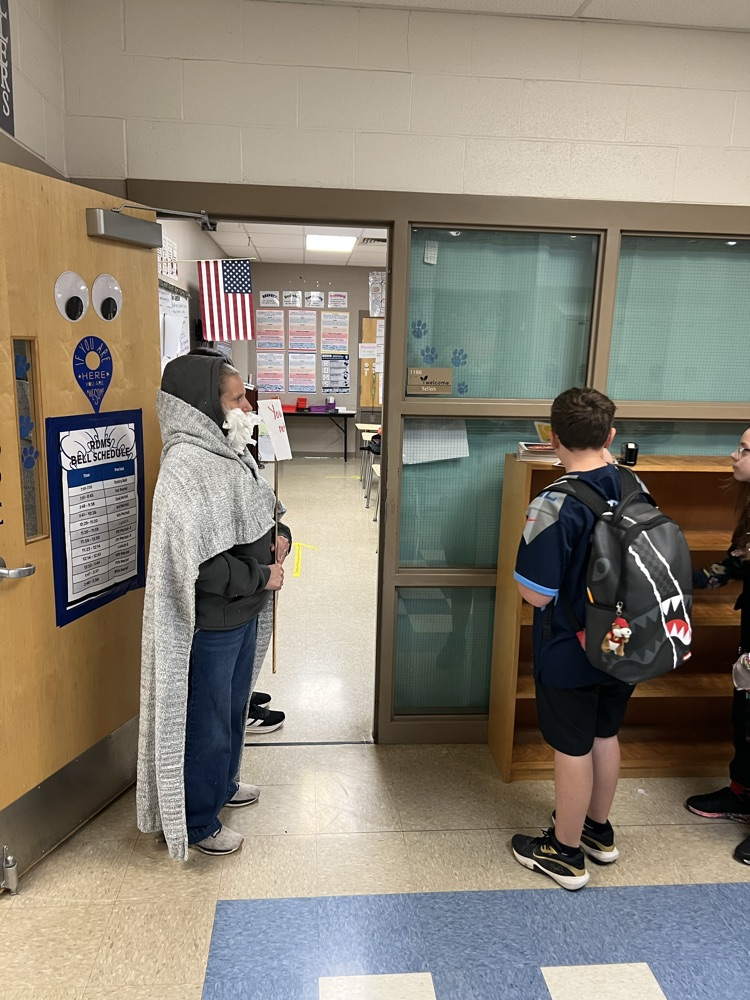 Student drawing an UNO card to enter class
