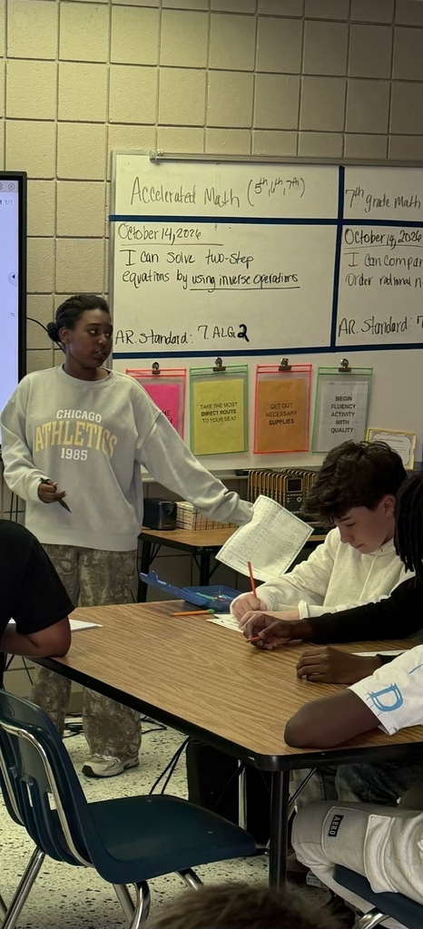 student teaching her peers