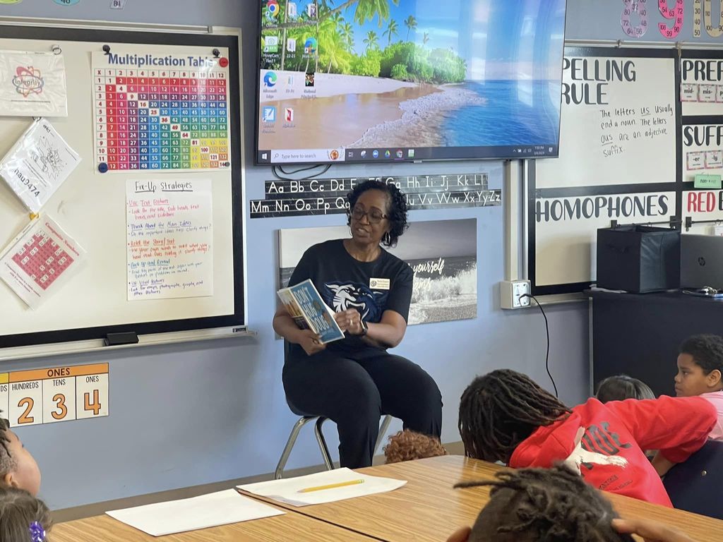 Read Across America Week Leaders reading to students