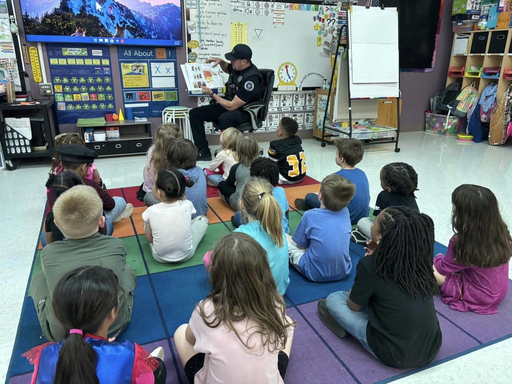 Read Across America Week Leaders reading to students