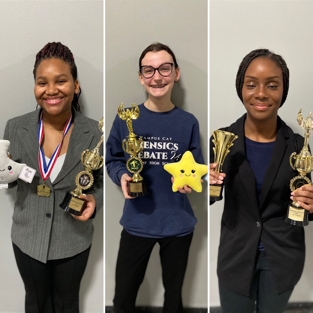 Forensics and Debate students with their awards.