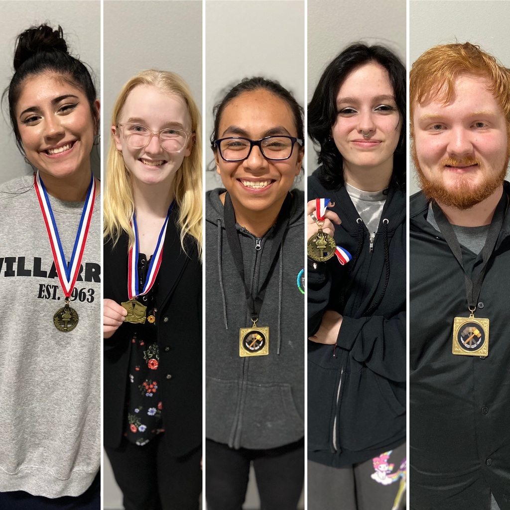 Forensics and Debate students with their awards.
