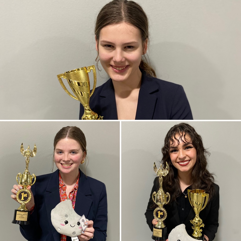 Forensics and Debate students with their awards.