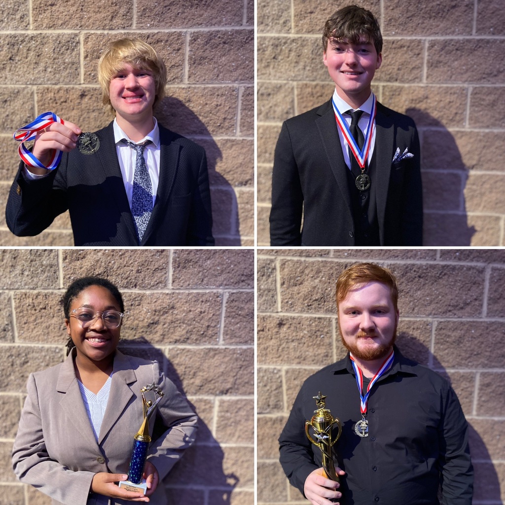 Forensics and Debate students with their awards.