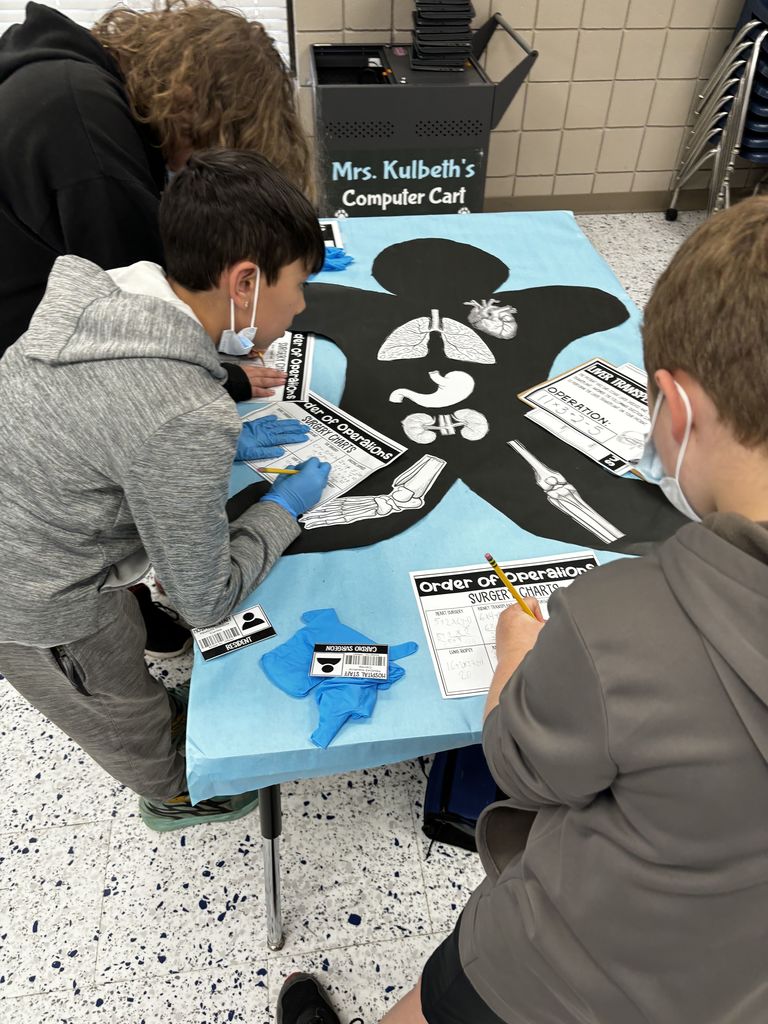 5th Grade math became surgeons as they practiced Order of Operations on "Operation" day. Students had to save their patients by solving order of operation problems.