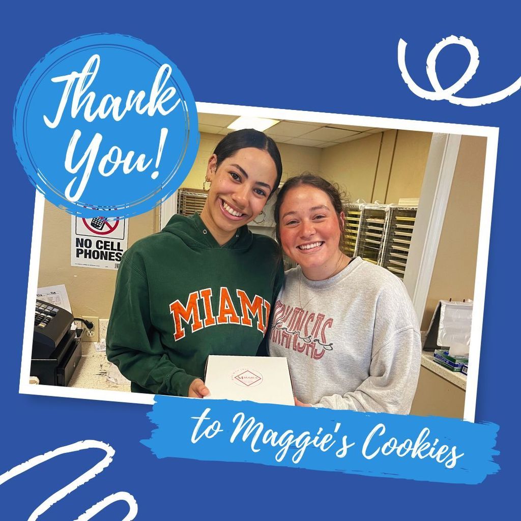 Thank you to Maggie's Cookies. Image of two ladies holding a box of cookies.