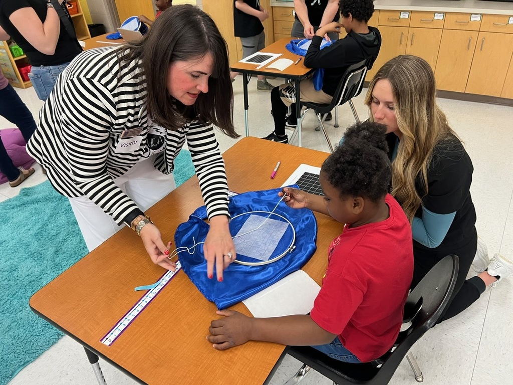 Students making birthday capes