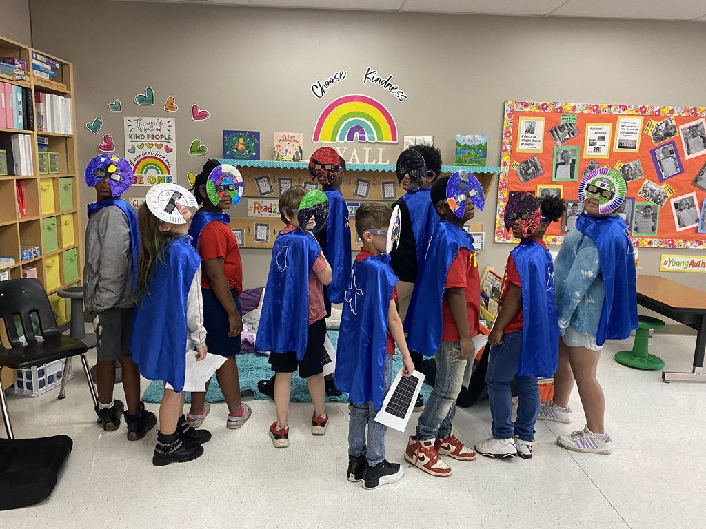 Students making birthday capes