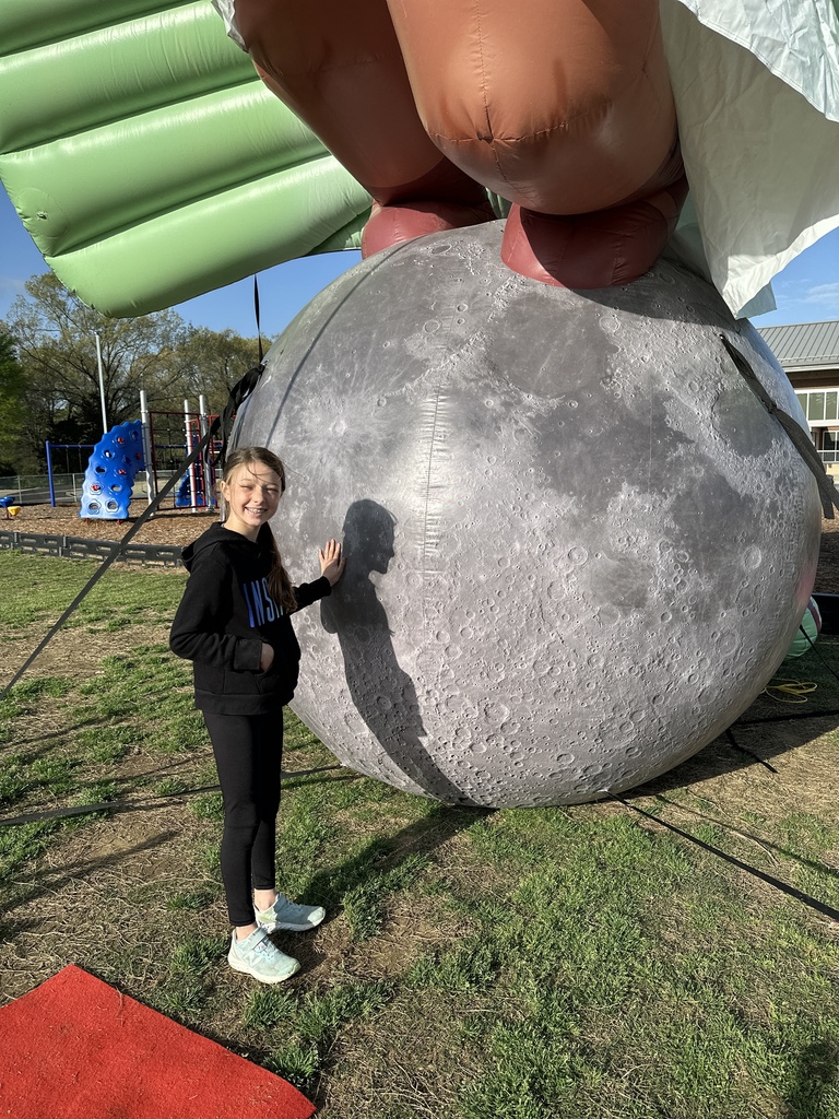 Students standing in front of LUNA