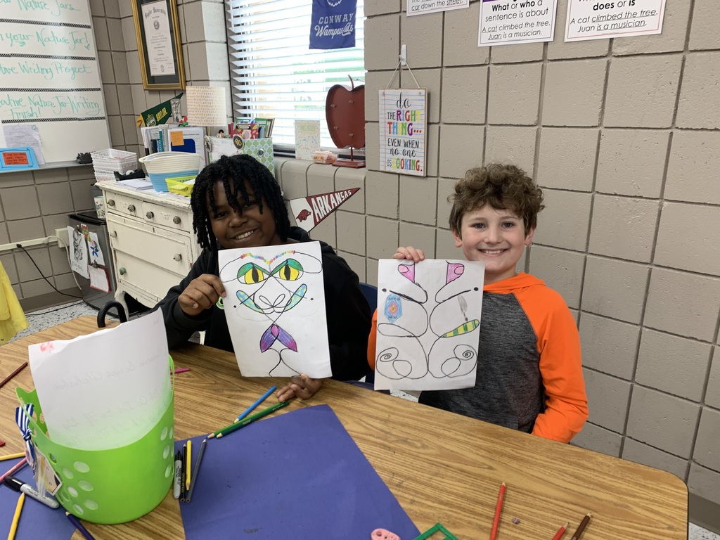 Students in Mrs. Mosley’s ELA classes enjoyed writing their names in cursive to create their Cursive Name Creatures. Can you find their lines of symmetry?