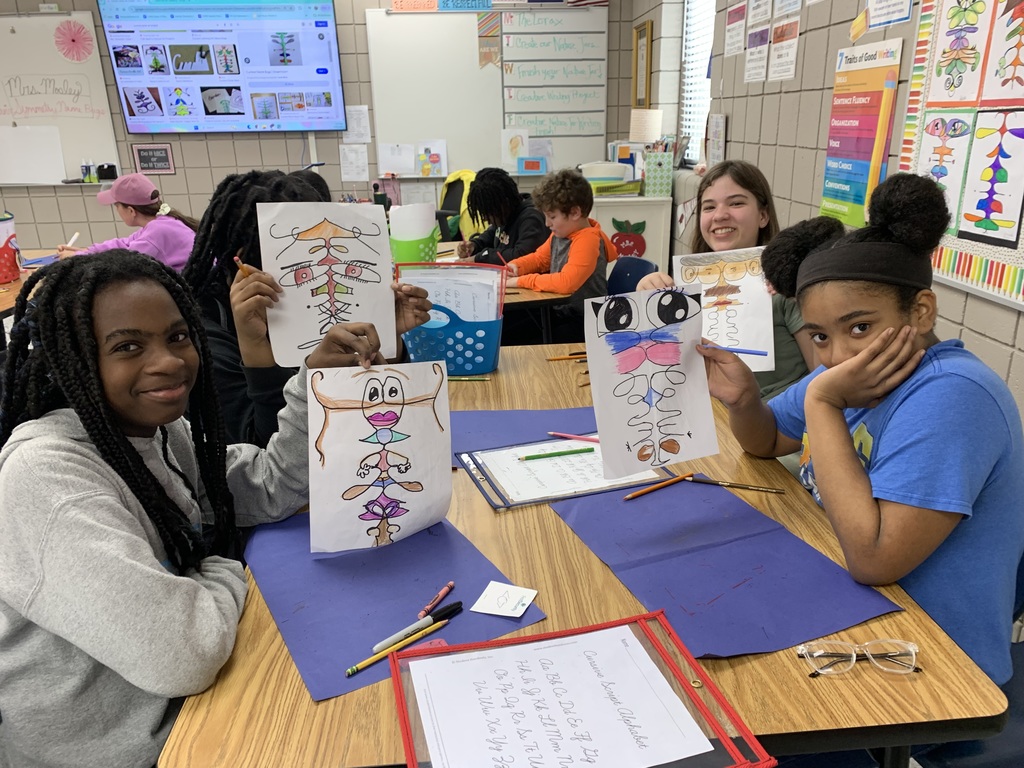 Students in Mrs. Mosley’s ELA classes enjoyed writing their names in cursive to create their Cursive Name Creatures. Can you find their lines of symmetry?