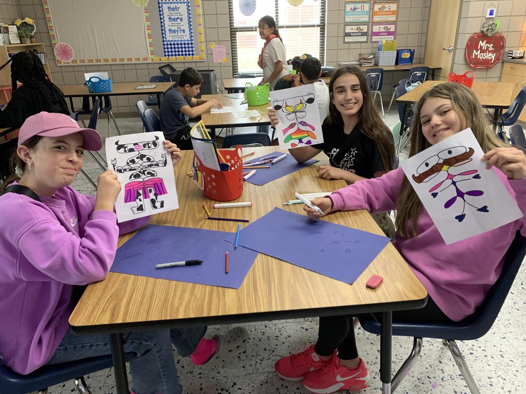 Students in Mrs. Mosley’s ELA classes enjoyed writing their names in cursive to create their Cursive Name Creatures. Can you find their lines of symmetry?