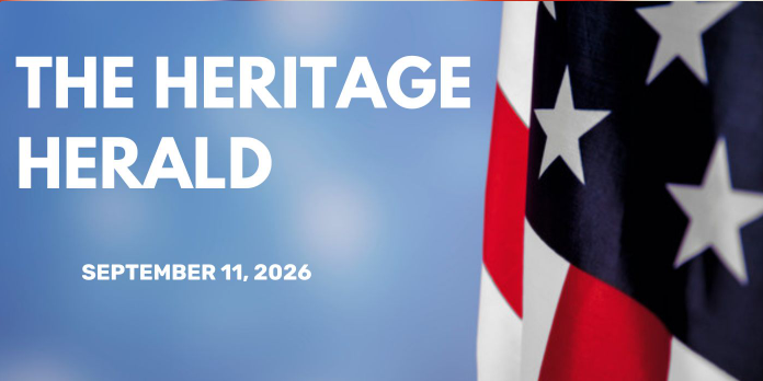 The Heritage Herald masthead and September 11, 2026 date appear beside a close-up American flag, evoking a solemn patriotic tone.