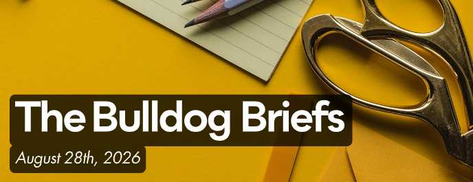 Newsletter graphic reading “The Bulldog Briefs” and “August 28th, 2026” on a mustard-yellow desk with scissors, pencils, and notebook.