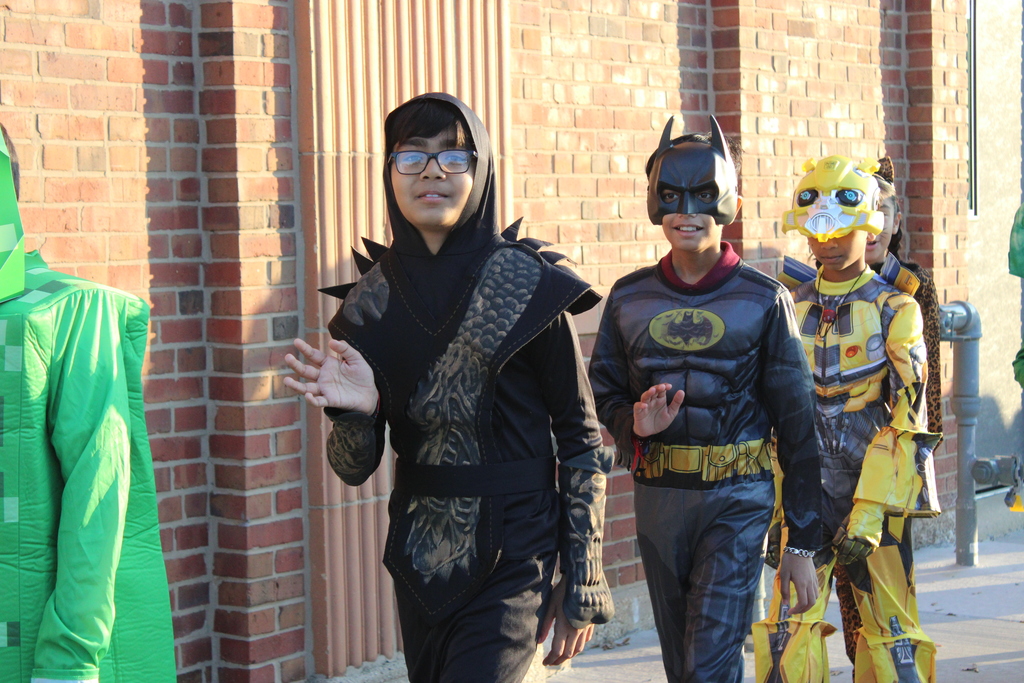 boys waving to camera