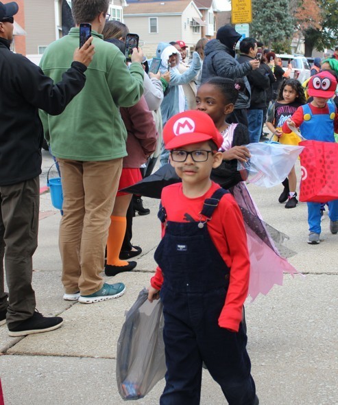 boy dressed as super mario