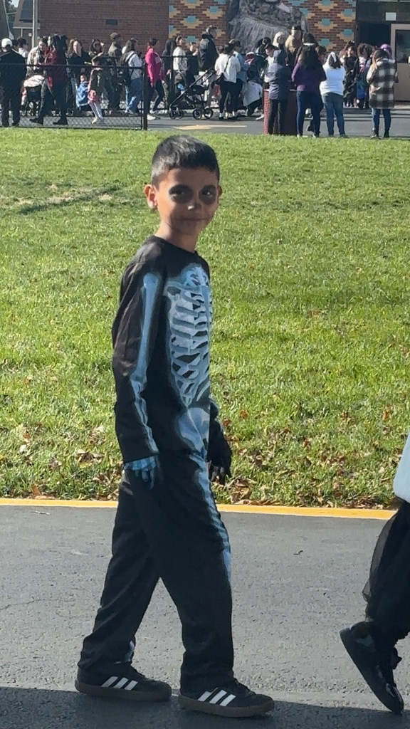 kid in skeleton costume