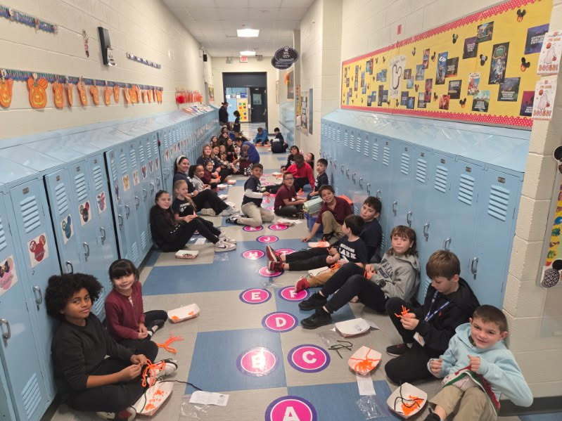 students doing crafts in hallway