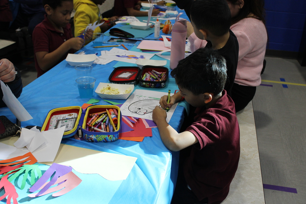 wharton student coloring a picture