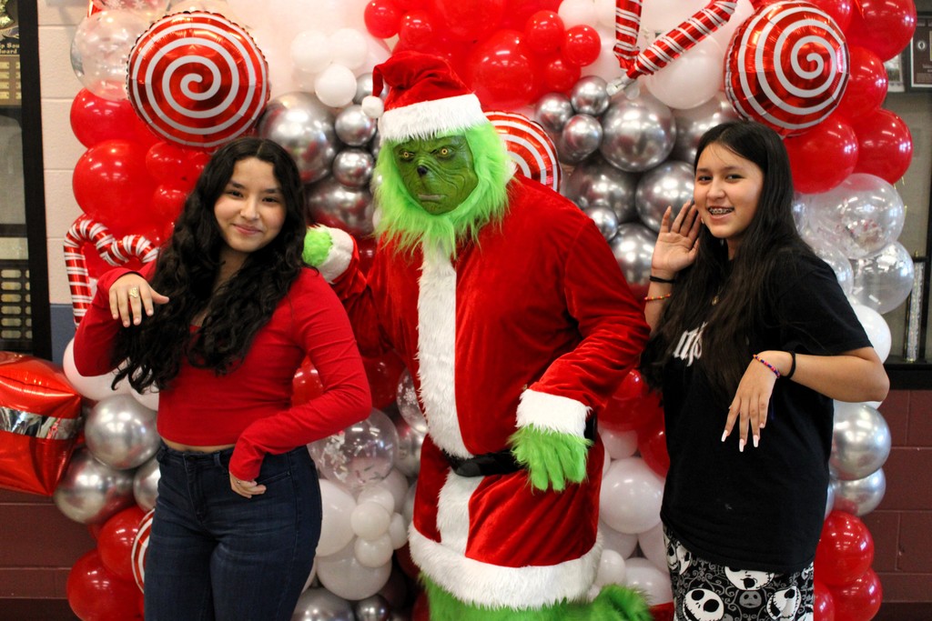 grinch with two students posing