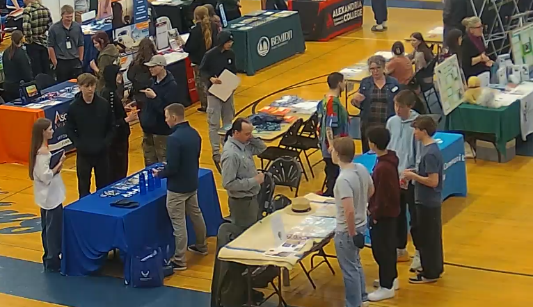 Cook County College Fair people walking around the tables talking to all vendors