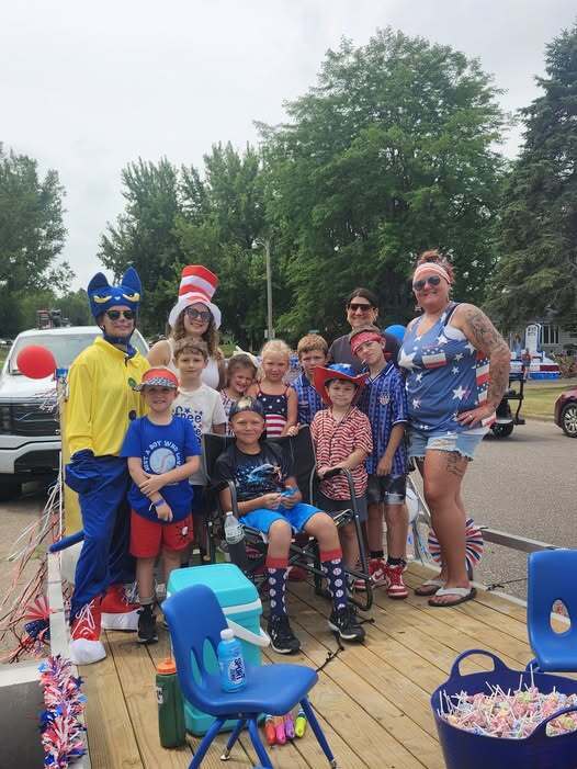 staff and children on a float for the Cadott parade