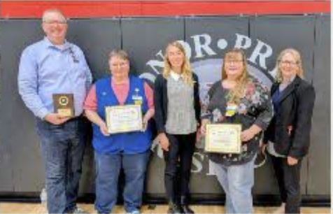 Walmart representative with school leaders