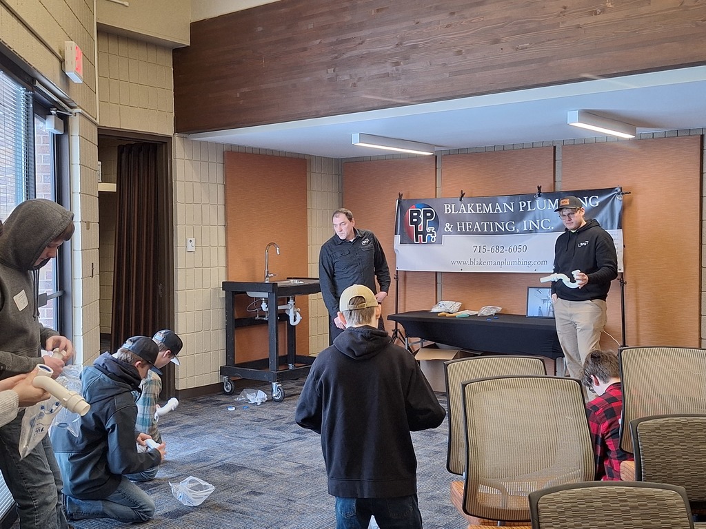 presenters and students at the event