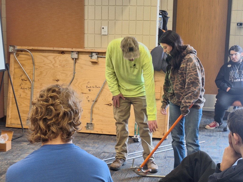 Student and presenter at event