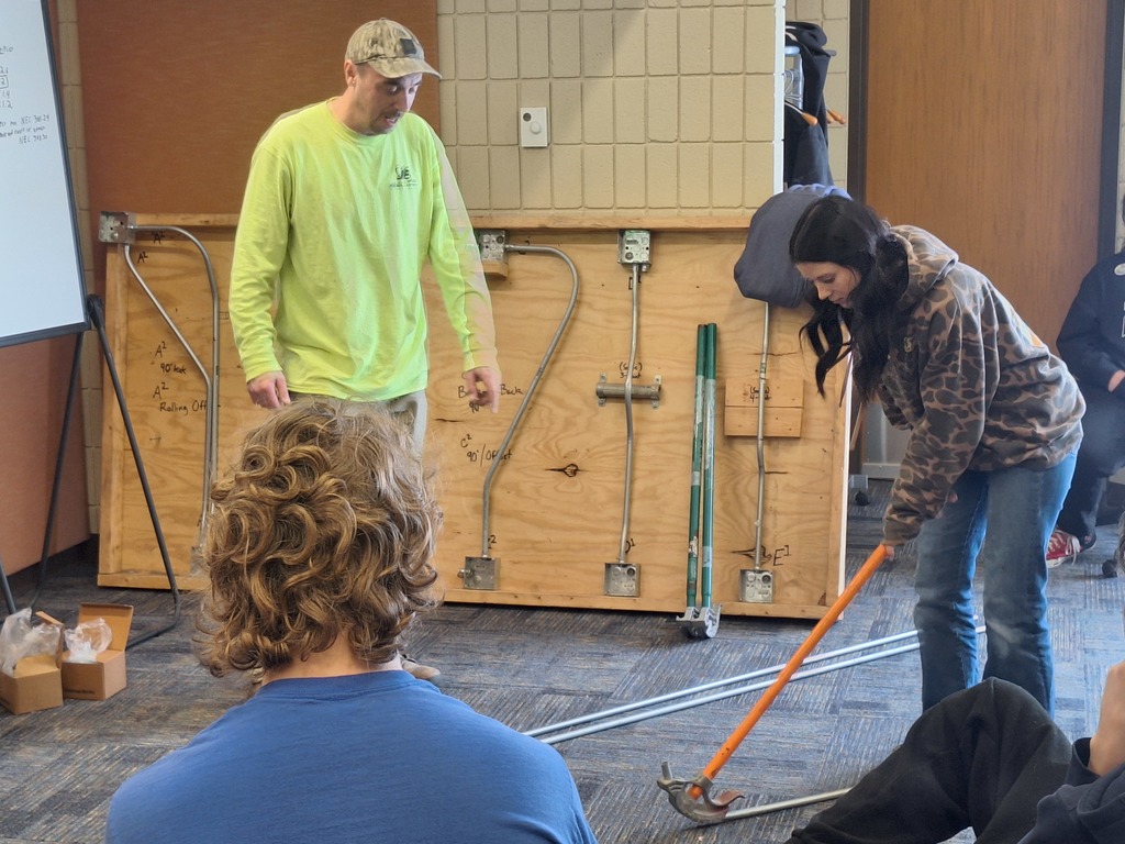 Student and presenter at event