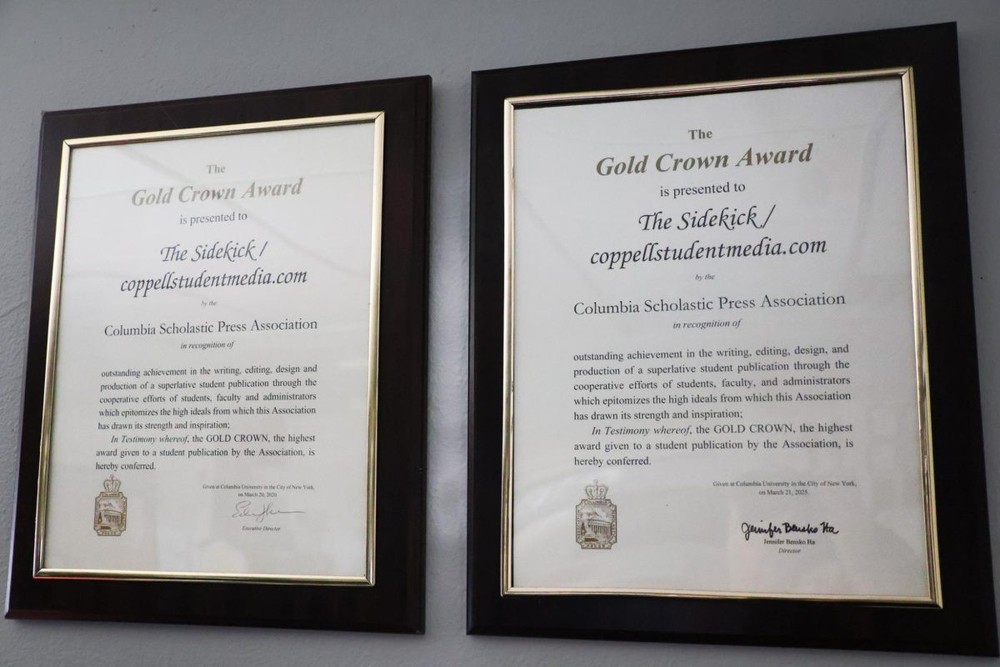 Two framed certificates hang side by side on a wall, each recognizing The Sidekick / coppellstudentmedia.com with the Gold Crown Award from the Columbia Scholastic Press Association for outstanding student publication achievement.