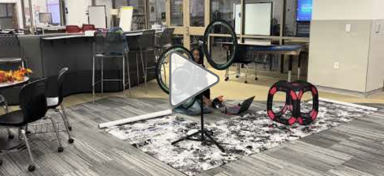 Video thumbnail of New Tech student Erin Achim and her computer, drone and drone obstacle course.