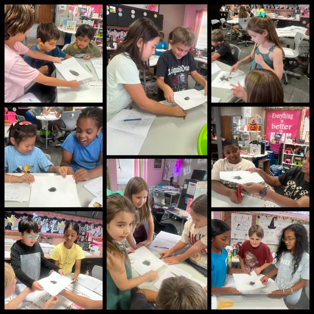 Collage of eight classroom photos showing elementary students working in small groups around tables. Students hold sheets of white paper and observe or interact with a small gray object placed on the paper as part of a hands-on learning activity. The classroom includes notebooks, pencils, educational materials, and colorful displays in the background. Several images show students collaborating, making observations, and discussing the object with classmates. Visible classroom decorations include posters and learning resources on the walls.