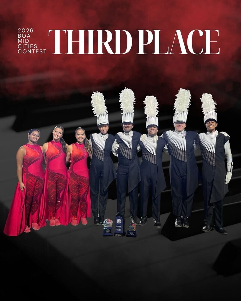 Eight marching band members pose with three awards beneath text reading “2026 BOA Mid Cities Contest — Third Place.” Three wear red performance costumes, and five wear navy-and-white uniforms with tall white plumes.