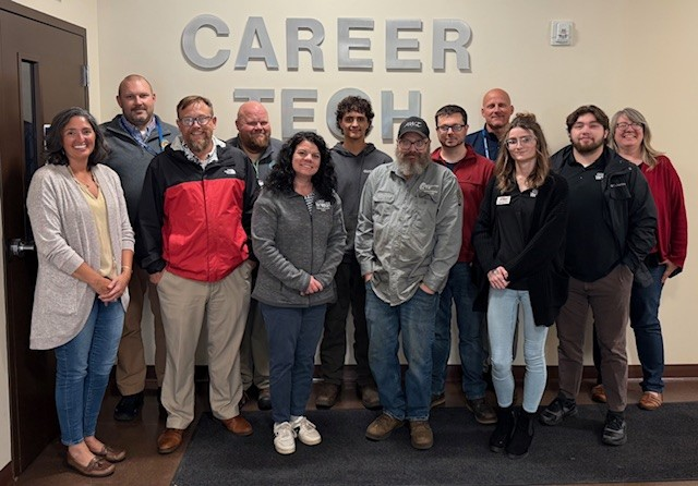 Photo of Connor Williams, the CTE instructors, the team from UP Michigan Works and GLSV