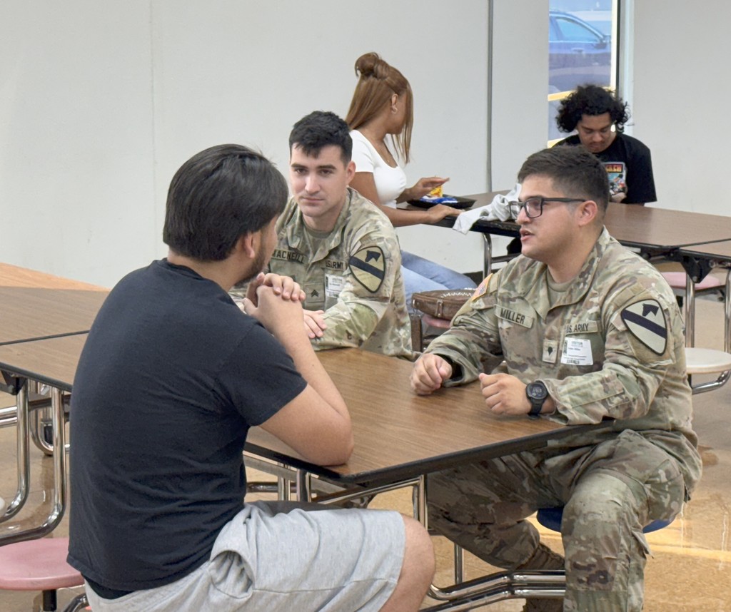 Soldiers sharing experiences with students on first day