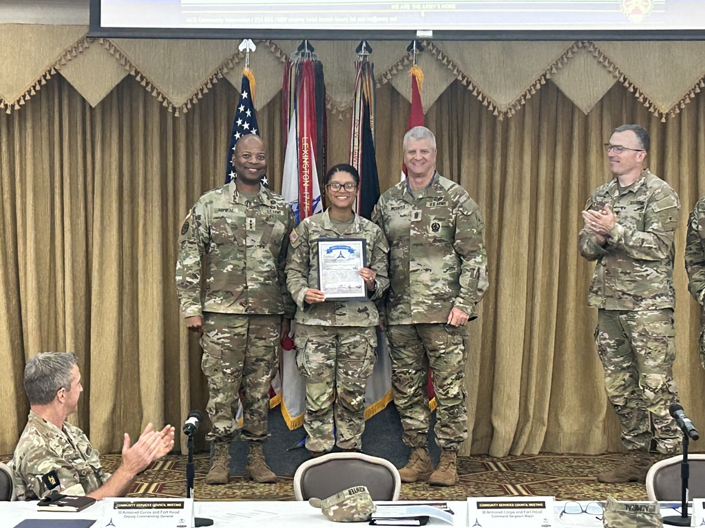 Photo of soldiers receiving an award