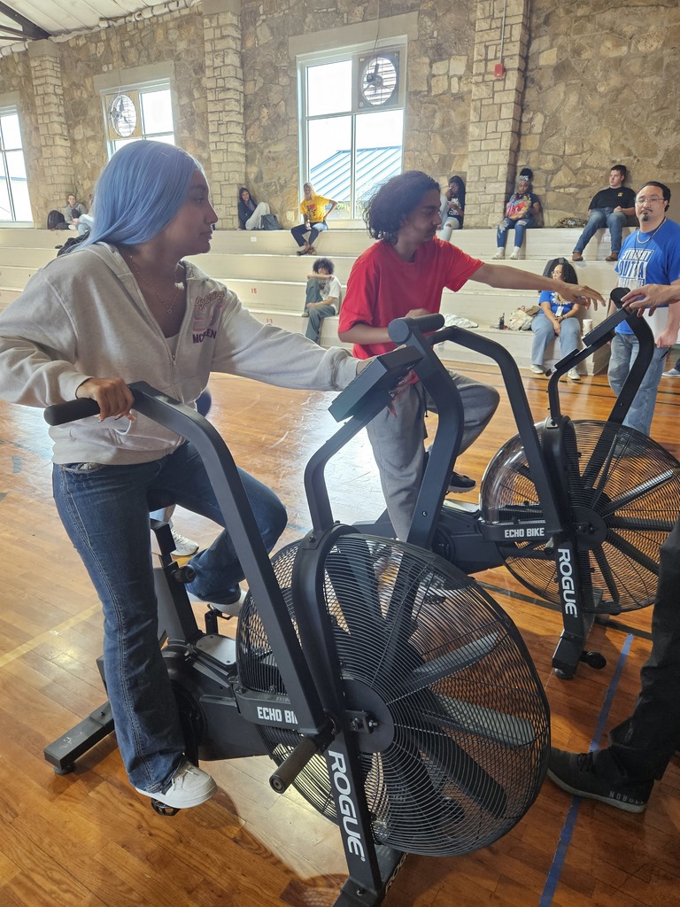 Picture of 2 students riding the cycles.