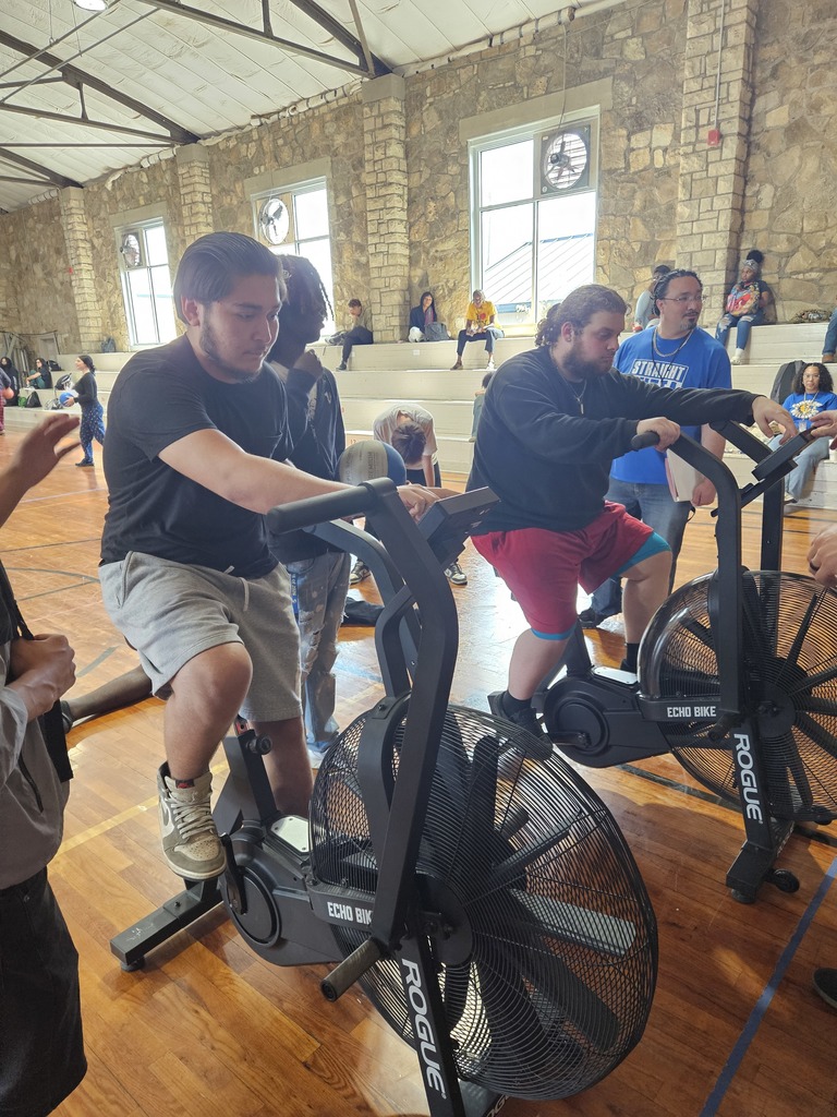 Picture of 2 students riding the cycles.
