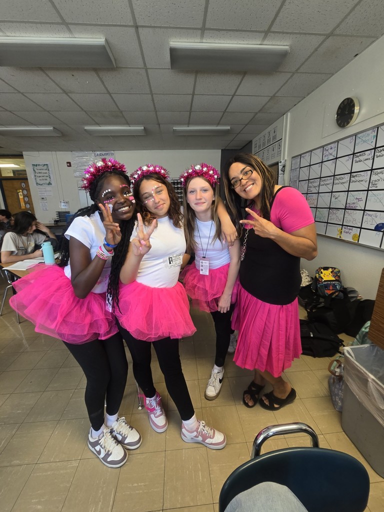 Teacher Alicia Weikum and her students show spirit.