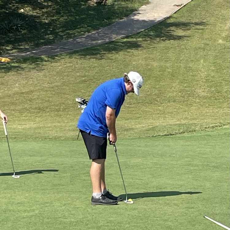 putting golf ball 