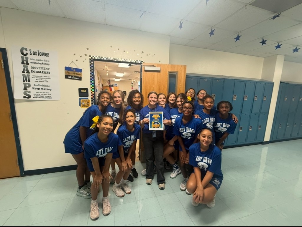 picture of Ms. McGinnis and the volleyball girls