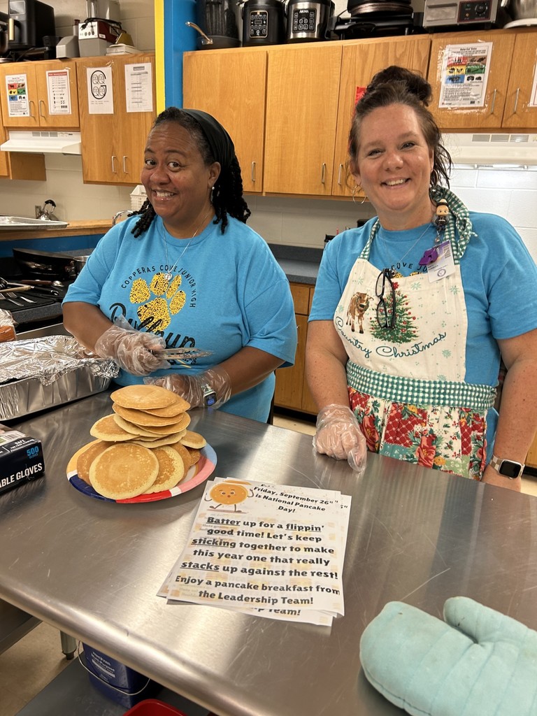 Teachers and staff celebrating National Pancake Day.
