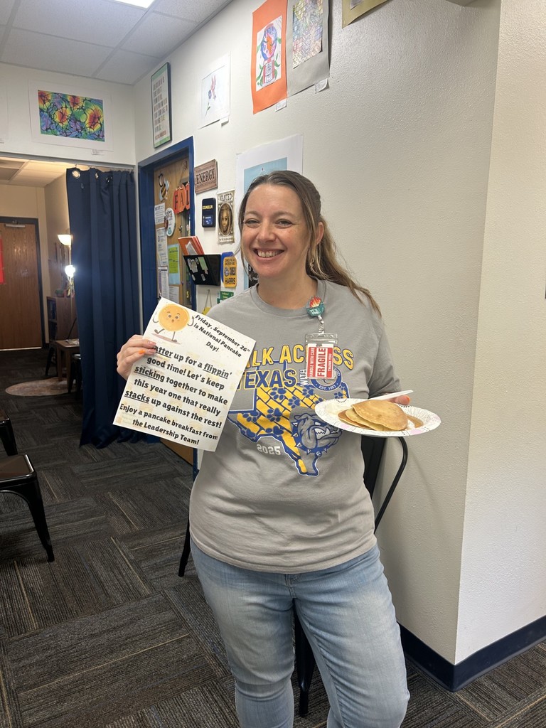 Teachers and staff celebrating National Pancake Day.
