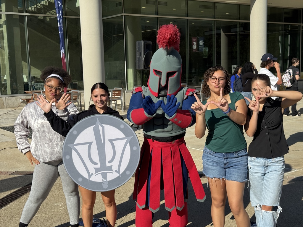 Picture of students with a Spartan mascot.