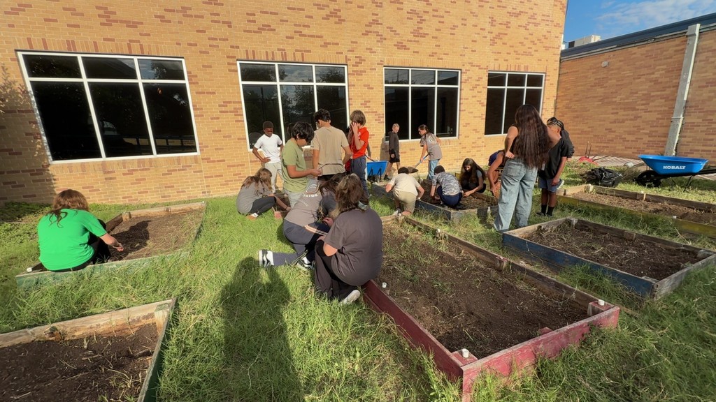Students working on the gardens