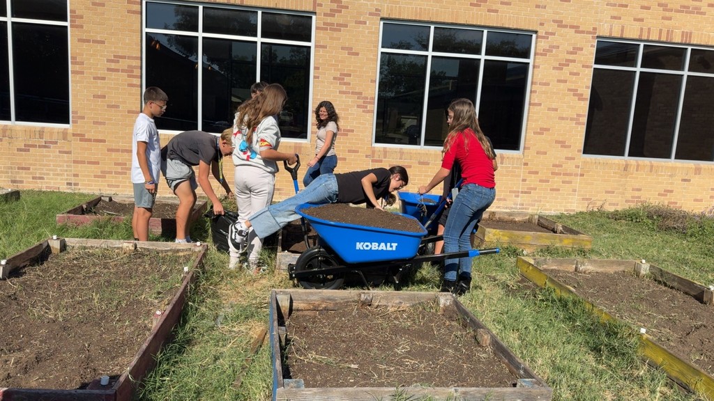 Students working on the gardens